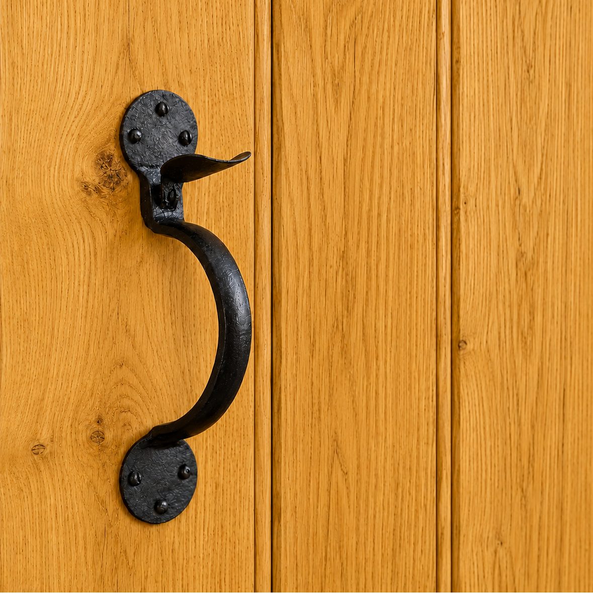 Product Closeup Of Suffolk Latch Handle On A Solid Oak Barn Door